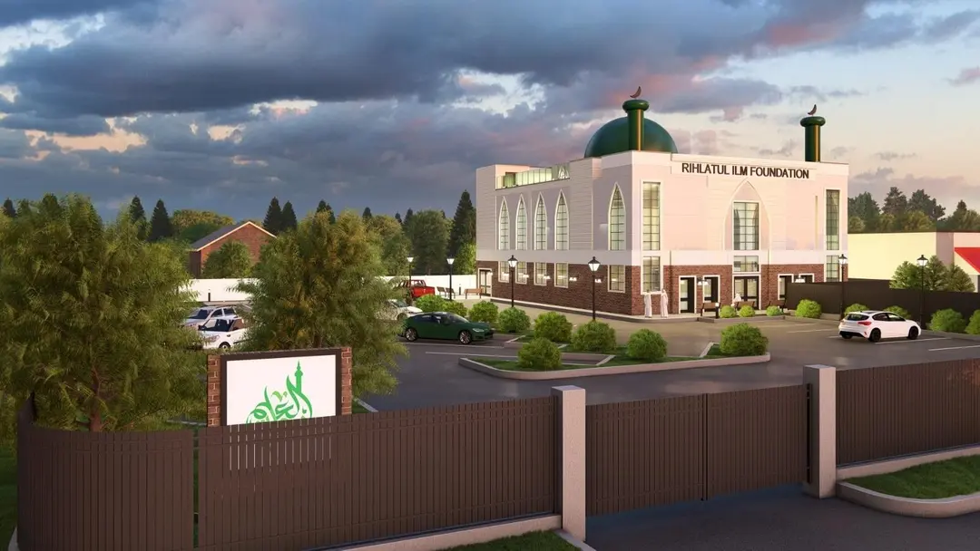 A rendering of the planned building at dusk, from across the street beyond a boundary fence, with the lit monument sign in the foreground.